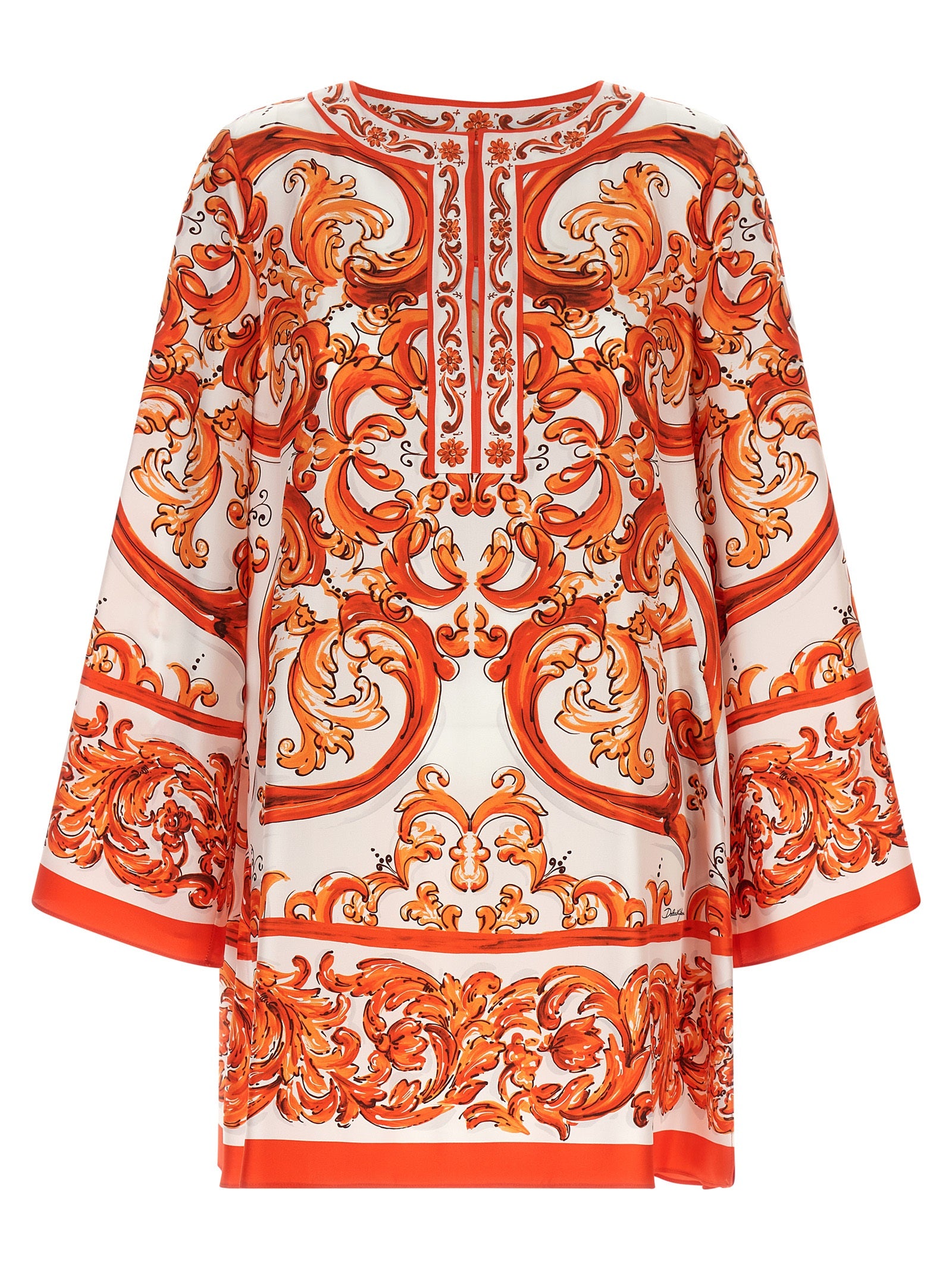 Robe courte en soie orange de Dolce & Gabbana, style élégant avec détails raffinés, portée sur un mannequin.