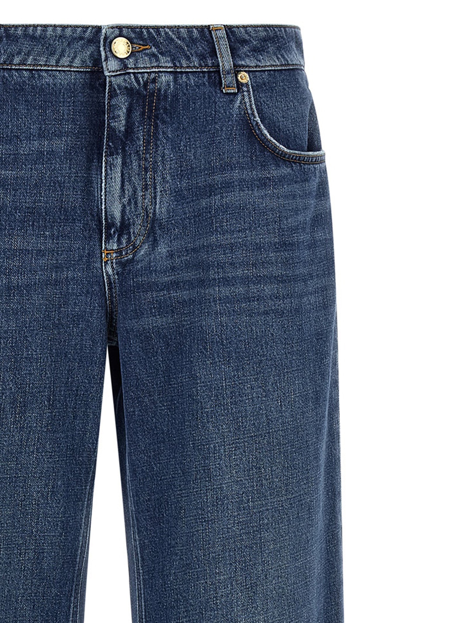 Jeans en coton bleu Dolce & Gabbana, coupe décontractée, visibles en détail avec poches et coutures classiques.