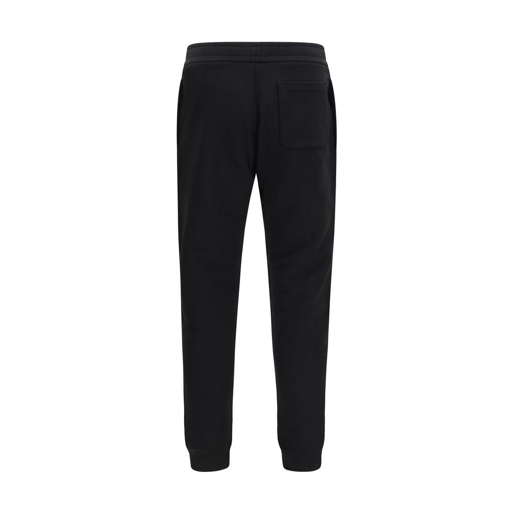Pantalons de sport en coton noir Moncler, coupe décontractée, design moderne, parfaits pour l'activité sportive ou casual.