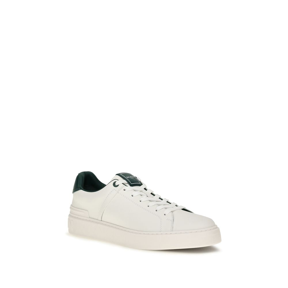 Sneakers Balmain en cuir de veau blanc Bos Taurus, chaussures de sport élégantes avec logo emblématique et design moderne.
