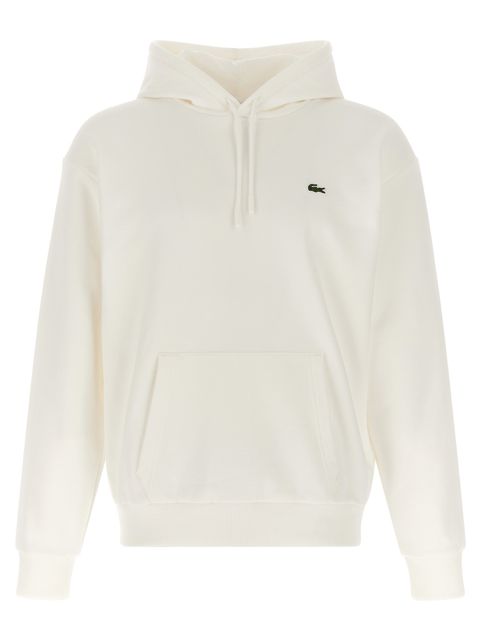Sweat-shirt blanc en coton de Lacoste avec logo crocodile, manches longues et col rond, porté sur un mannequin.