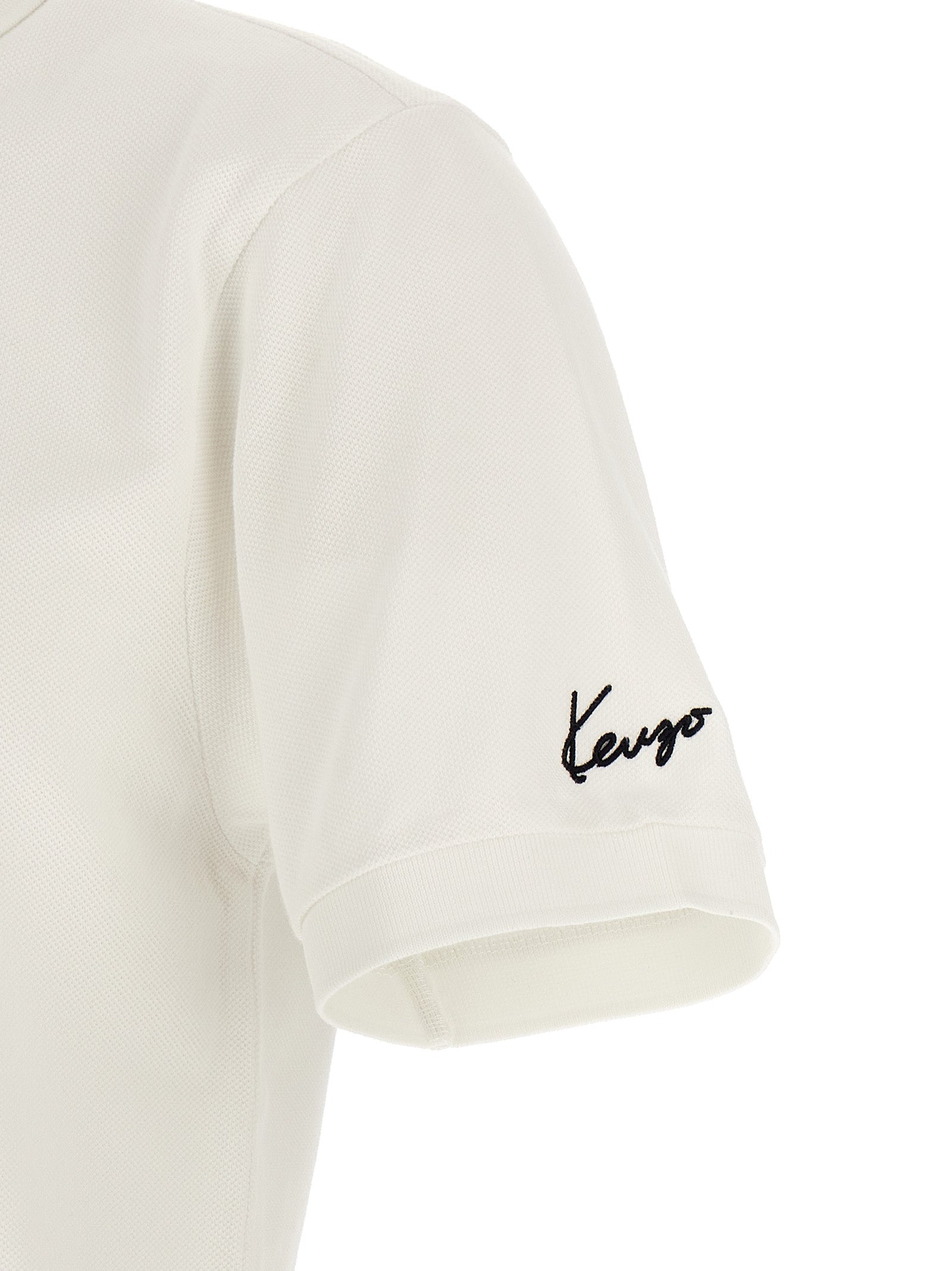 Chemise polo blanche en coton de la marque Kenzo, vue de face, avec col classique et logo discret.