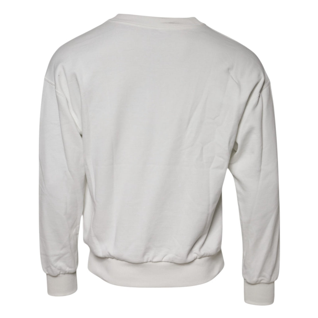 Pull blanc en coton Dolce & Gabbana avec logo embossé, col rond et coupe classique, visible en gros plan.