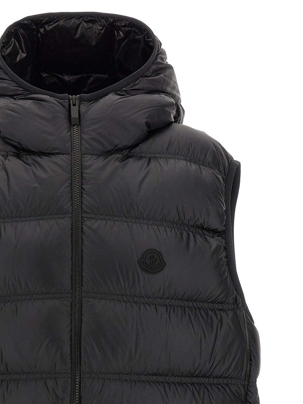 Veste sans manches Moncler en polyamide noire, légère et résistante, avec capuche amovible et design élégant.