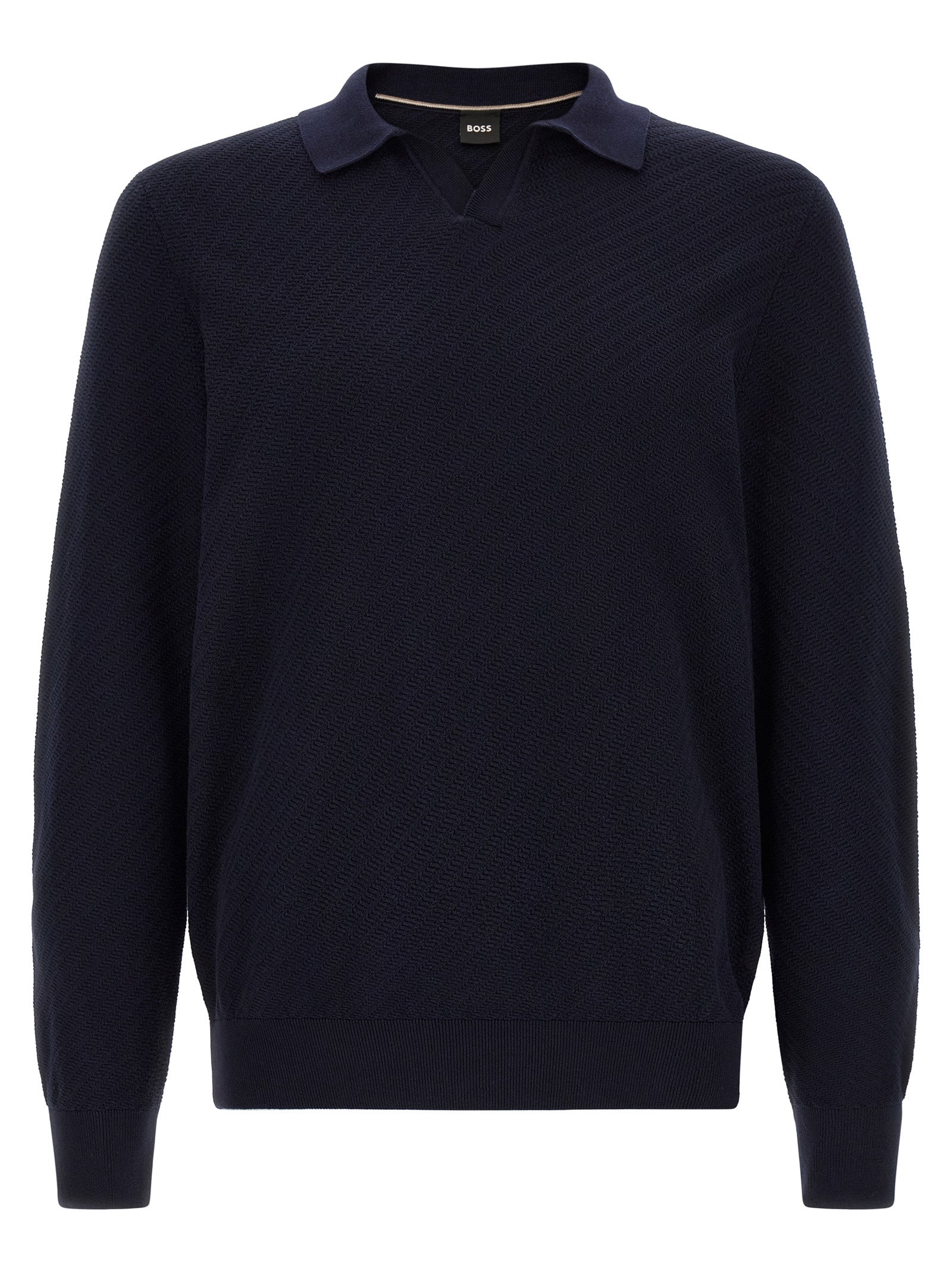 Chemise polo en coton bleu de la marque Hugo Boss, détails du col et logo discret visible sur le vêtement.
