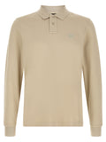 Chemise polo beige en coton de la marque Hugo Boss, avec col classique et logo discret sur la poitrine.
