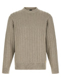 Cardigan beige en coton de la marque Hugo Boss, doux et élégant, porté sur un mannequin.