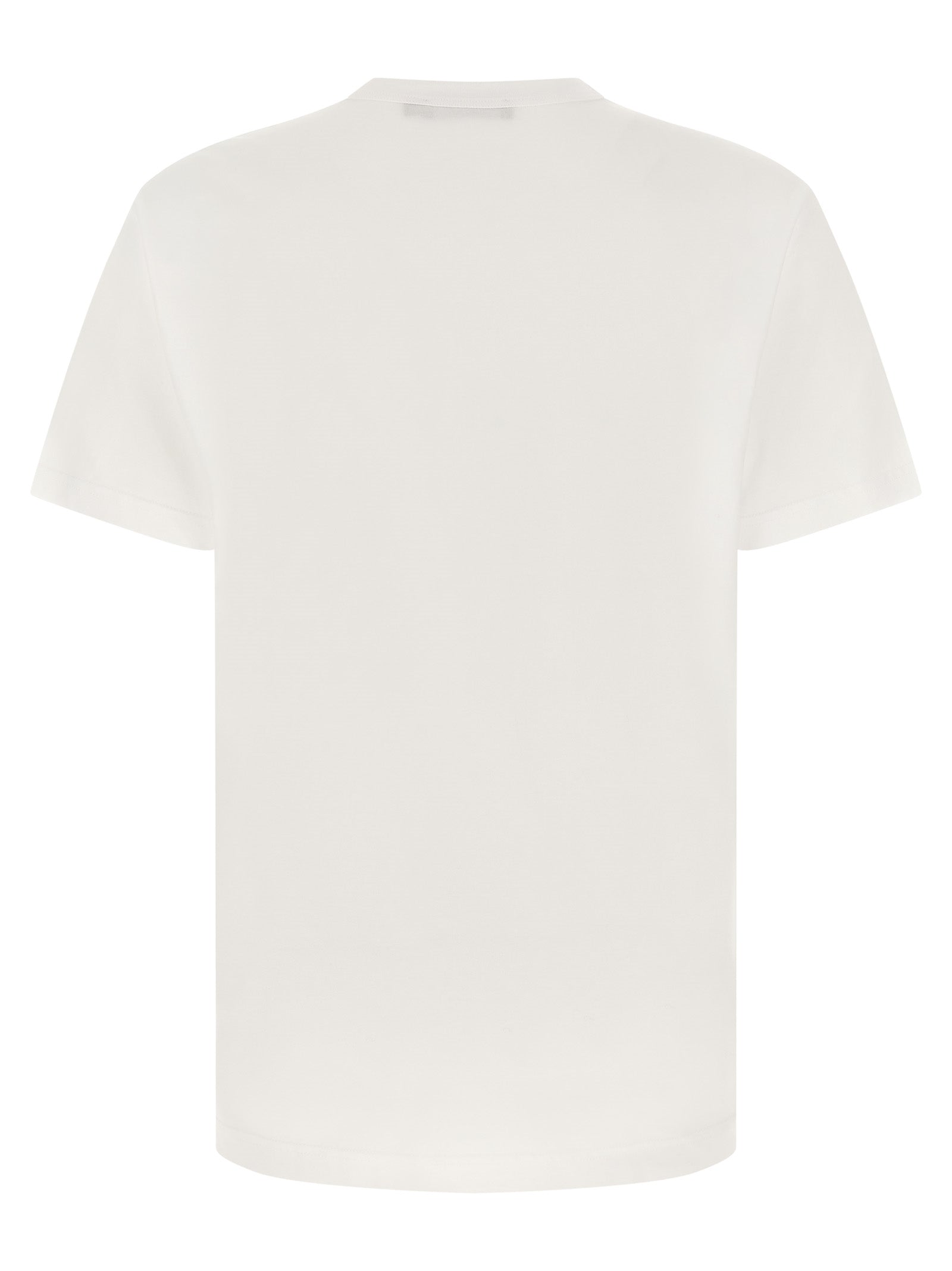 T-shirt blanc en coton Dolce & Gabbana porté, avec logo Dolce & Gabbana visible sur le devant.
