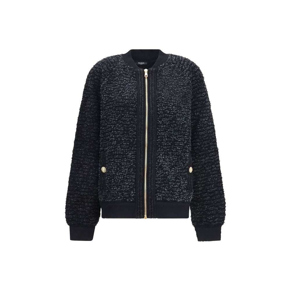 Veste bomber noire en viscose de Balmain, avec détails élégants et coupe moderne, visible sur cette image.