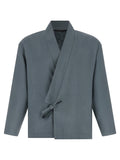Blazer en laine gris de Kenzo, veste élégante pour homme ou femme, avec coupe moderne et détails sophistiqués.