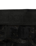 Dolce & Gabbana Schwarze Strumpfhose mit Allover-Logo-Print