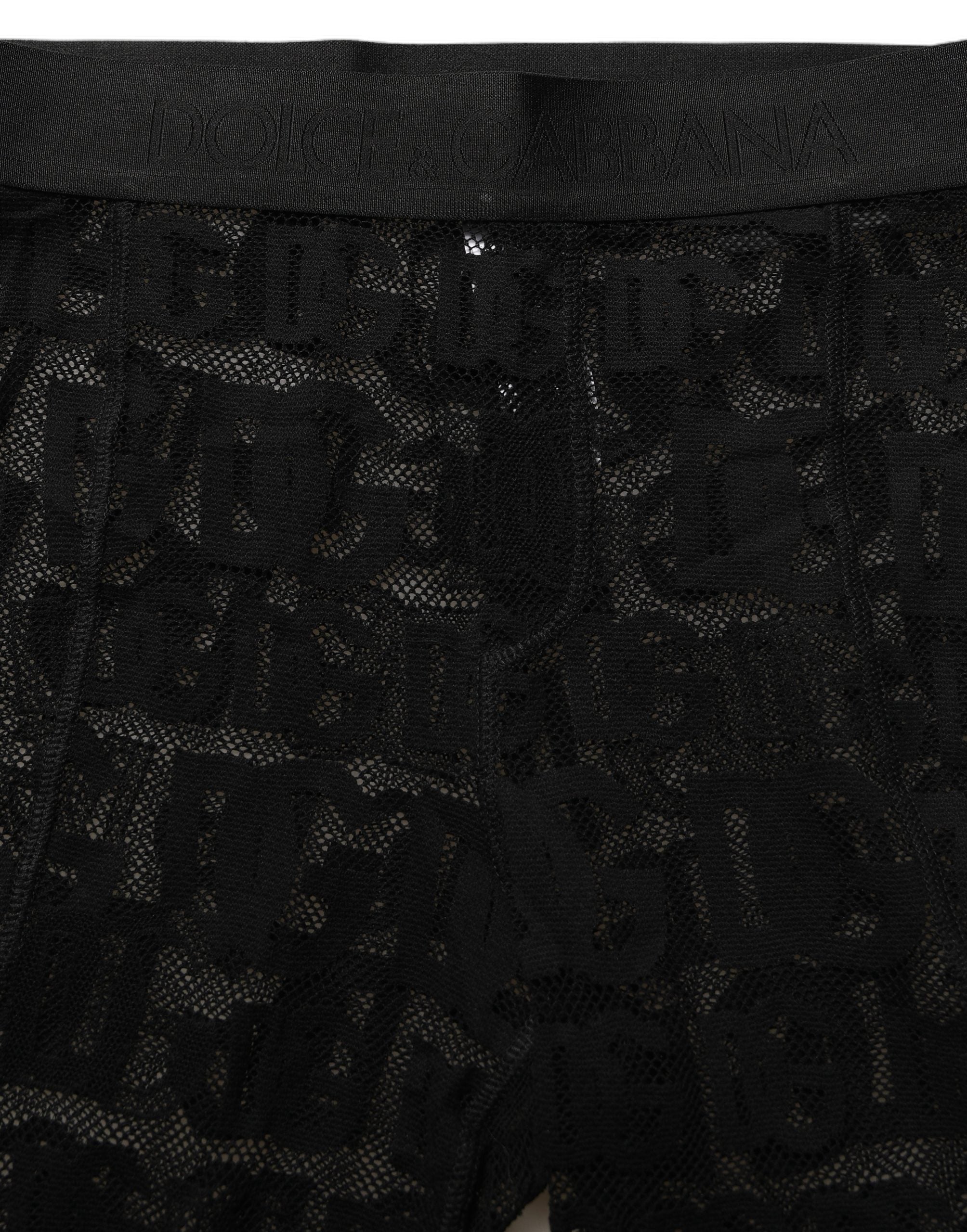 Dolce & Gabbana Schwarze Strumpfhose mit Allover-Logo-Print