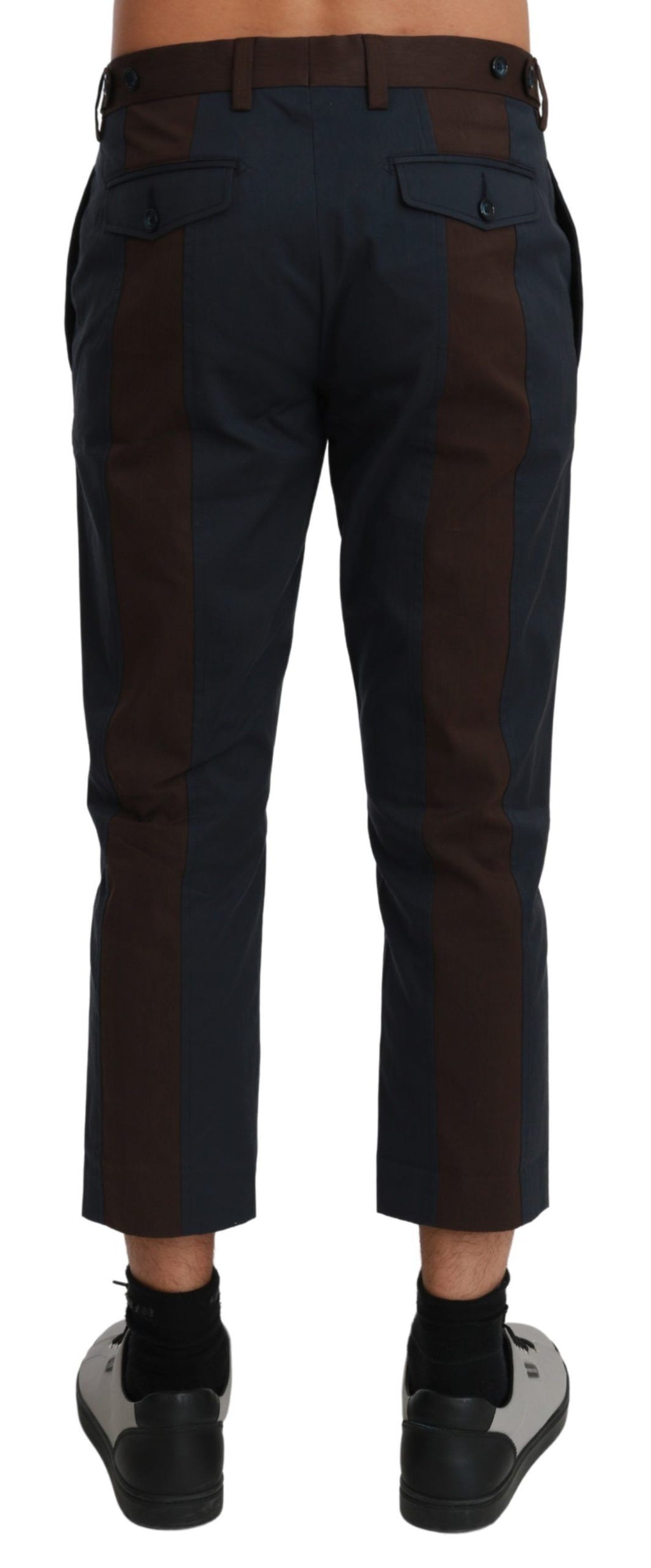 Pantalons cropped à rayures marron de Dolce & Gabbana, style élégant avec coupe moderne, visibles en gros plan sur fond neutre.