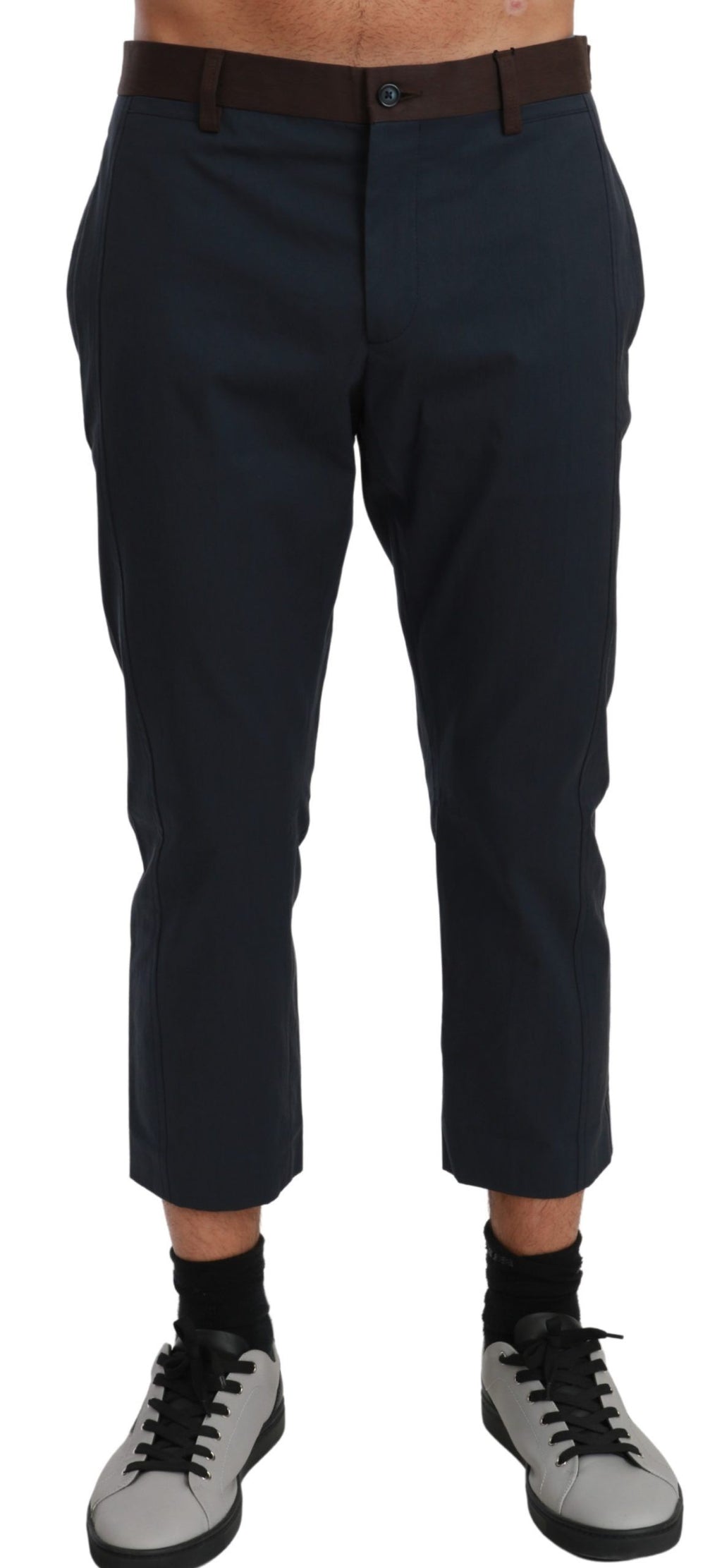 Pantalon cropped Dolce & Gabbana à rayures marron, tissu léger et coupe moderne visible sur l'image.