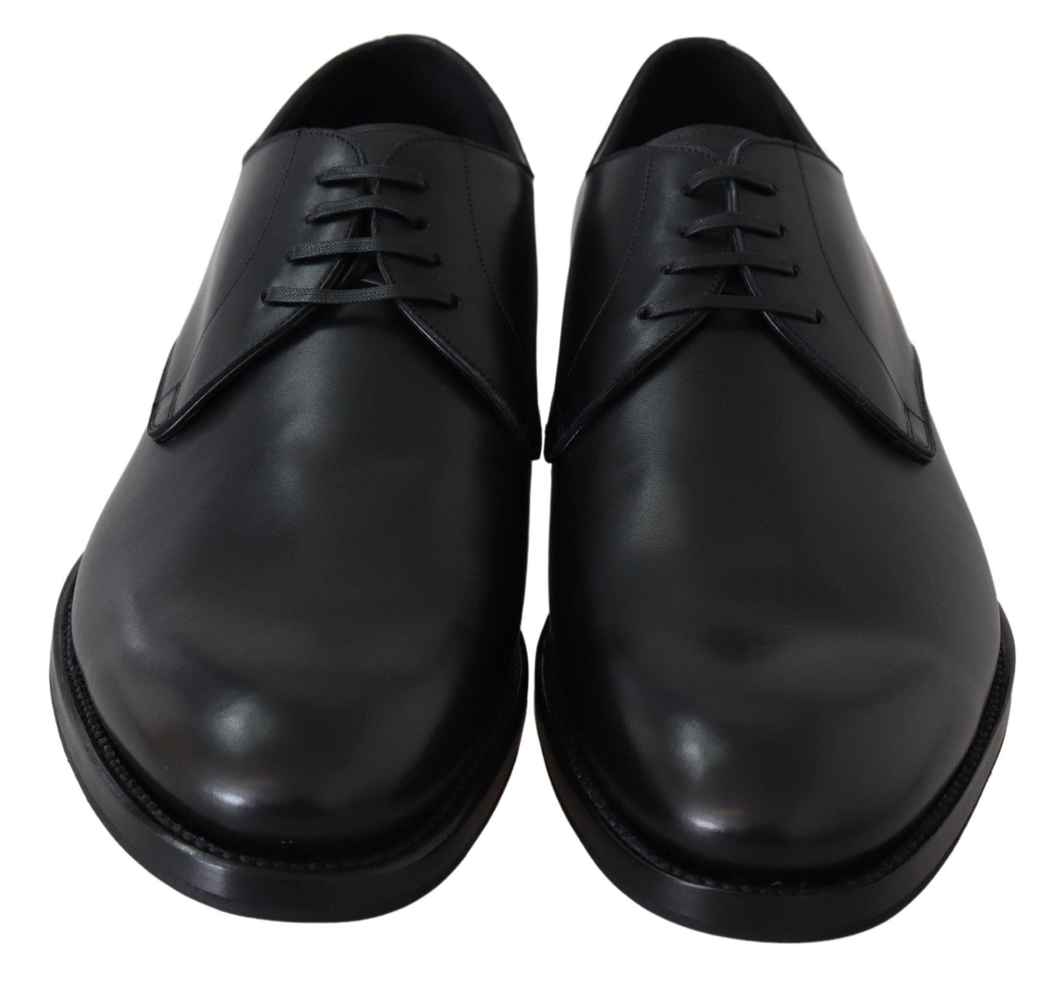 Chaussures en cuir noir Dolce & Gabbana SARTORIA faites à la main, détails élégants et finition raffinée visible.