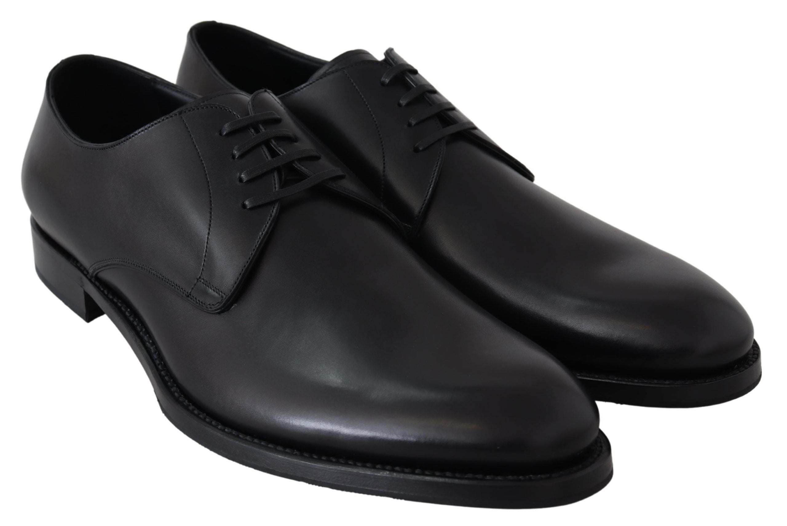 Chaussures en cuir noir Dolce & Gabbana SARTORIA faites main, vue détaillée de la semelle et du design élégant.