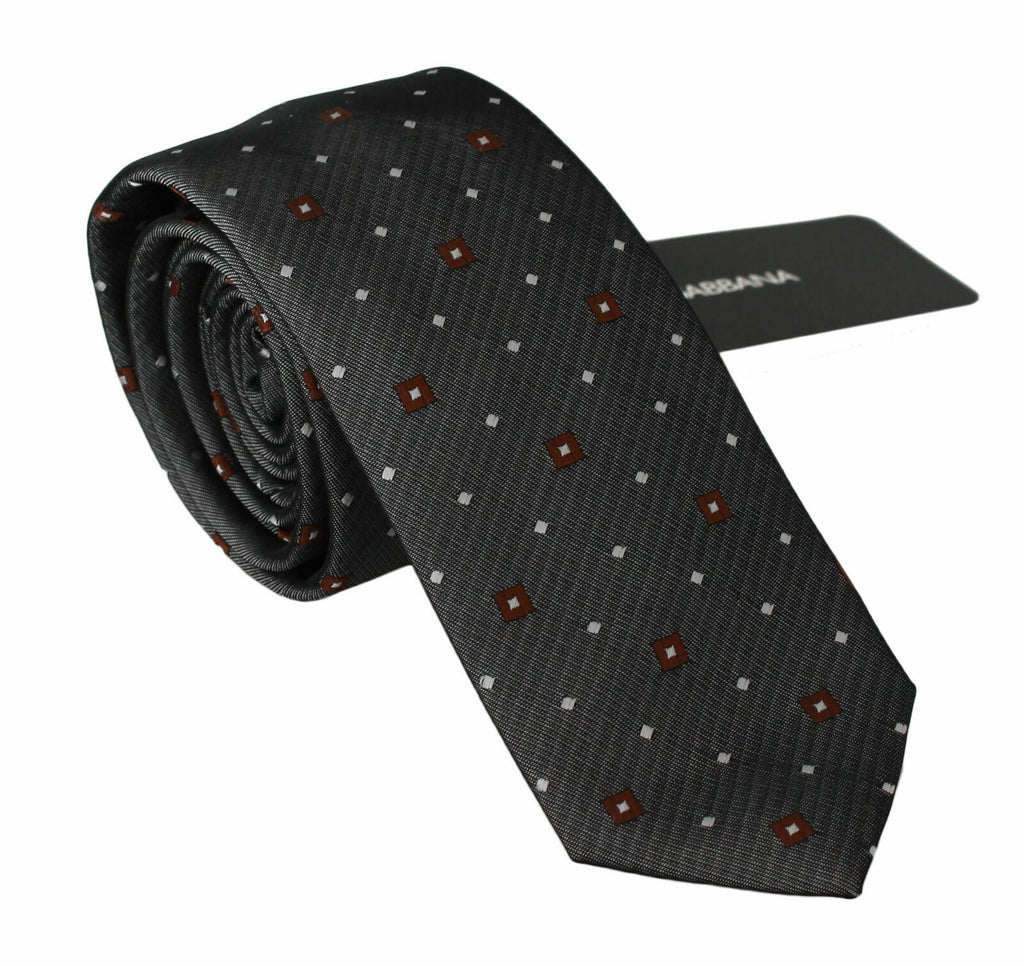 Cravate homme Dolce & Gabbana gris à motif classique, élégante et slim, en tissu de qualité pour un style sophistiqué.
