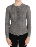Pull en laine noir et blanc Dolce & Gabbana, cardigan élégant avec détails texturés, porté ouvert sur fond neutre.