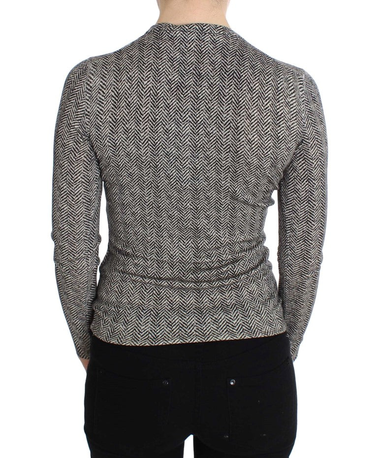Cardigan en laine noir et blanc Dolce & Gabbana, haut élégant en cachemire avec boutons, porté sur un mannequin.