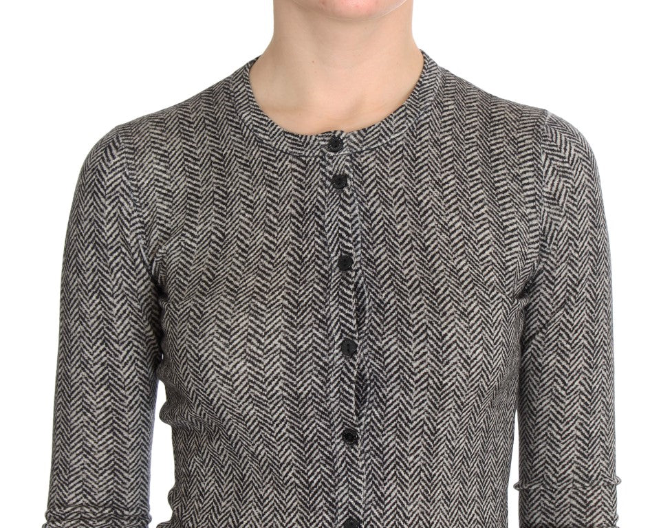 Pull en laine noir et blanc Dolce & Gabbana, cardigan élégant avec boutons, porté ouvert ou boutonné, vue de face.