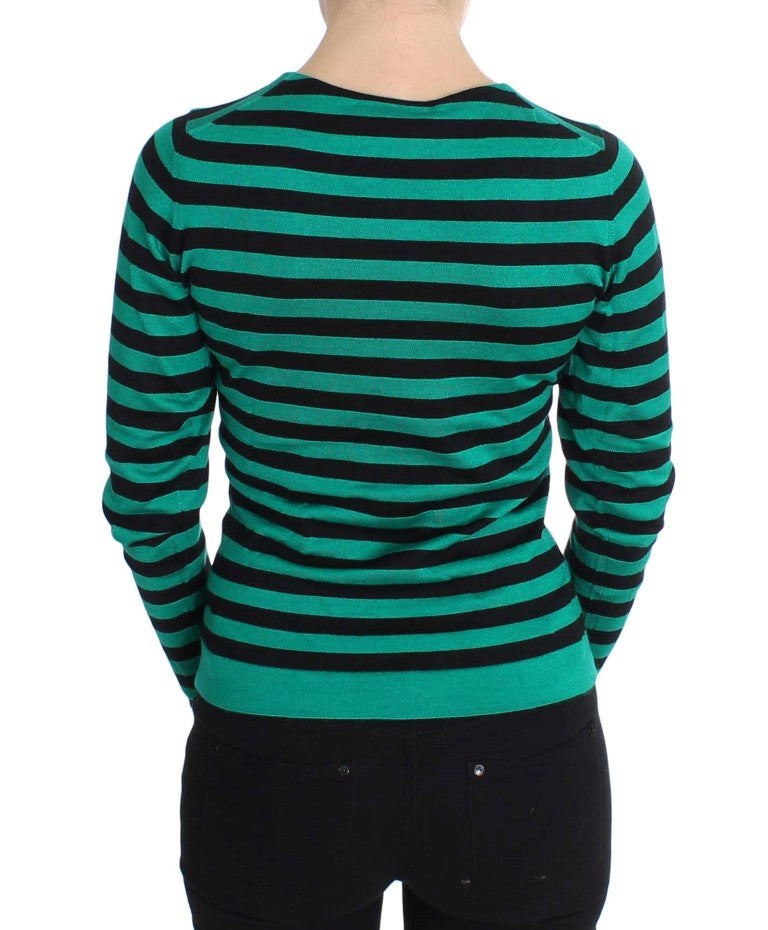 Pull en soie et cachemire vert et noir Dolce & Gabbana, doux et élégant, avec détails raffinés visibles.