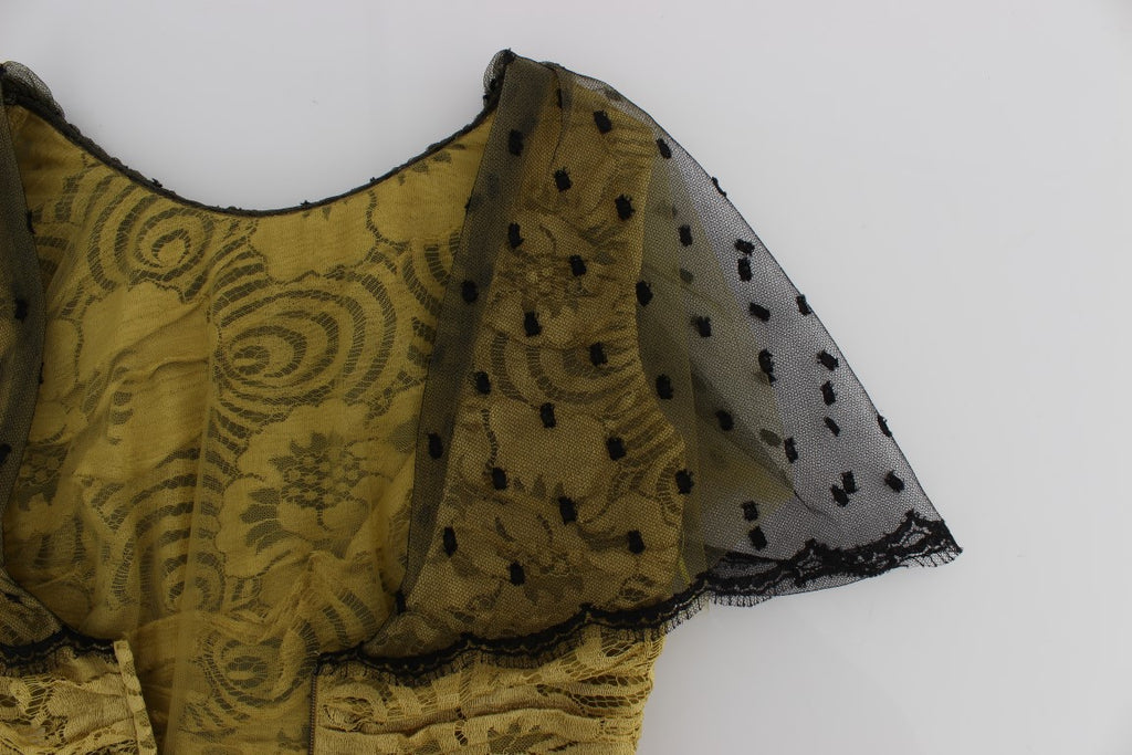 Robe Dolce & Gabbana en dentelle florale jaune et noire avec broderie ricamo, élégante et sophistiquée.