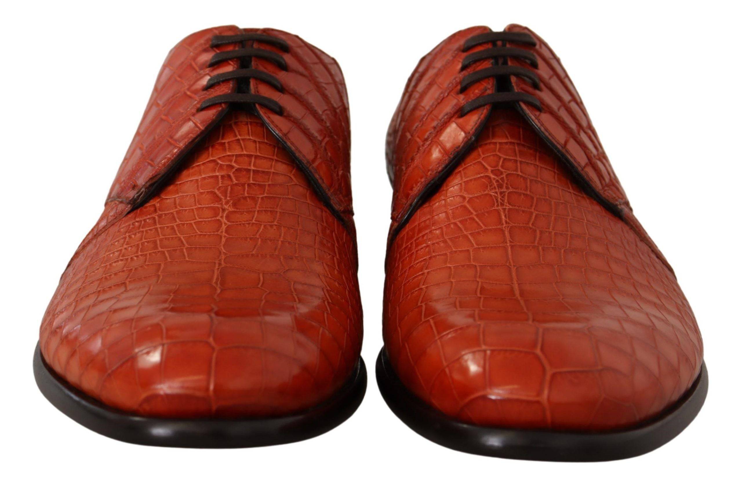 Chaussures Derby en cuir exotique orange de Dolce & Gabbana, style élégant et sophistiqué.