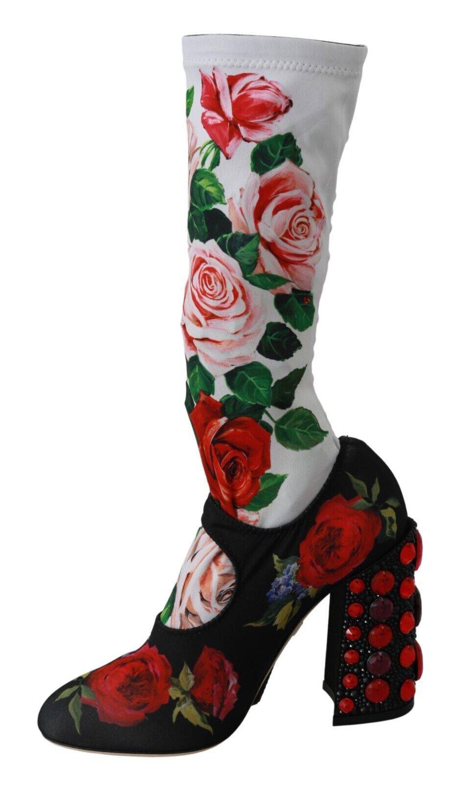 Chaussettes noires à motifs floraux Dolce & Gabbana avec cristaux, portées avec des bottines en jersey pour femmes.