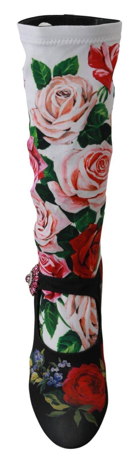 Chaussettes noires à fleurs Dolce & Gabbana avec cristaux, portées avec des bottines en jersey pour un look élégant et sophistiqué.