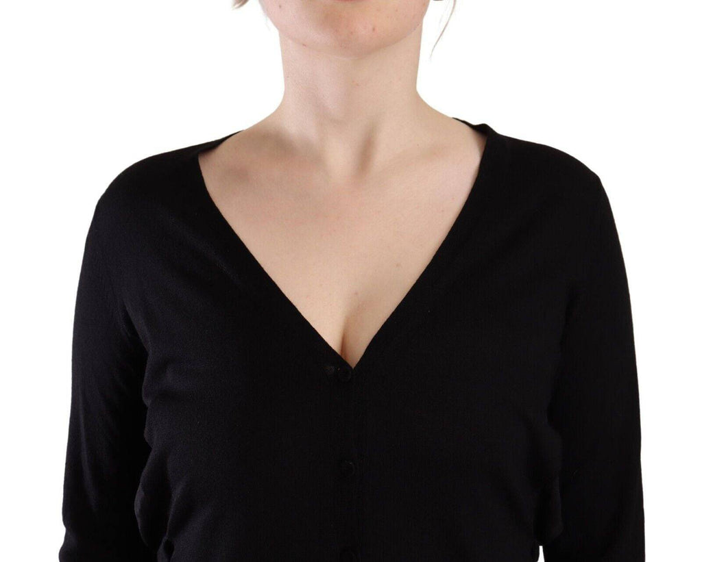 Pull-over en laine noire Dolce & Gabbana avec col en V et manches longues, élégant et confortable pour un style sophistiqué.