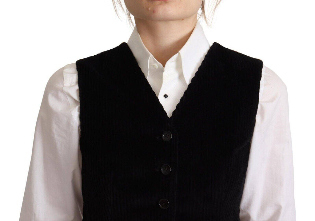 Gilet noir en velours côtelé à col en V avec boutons et motif léopard Dolce & Gabbana, porté sur un fond neutre.