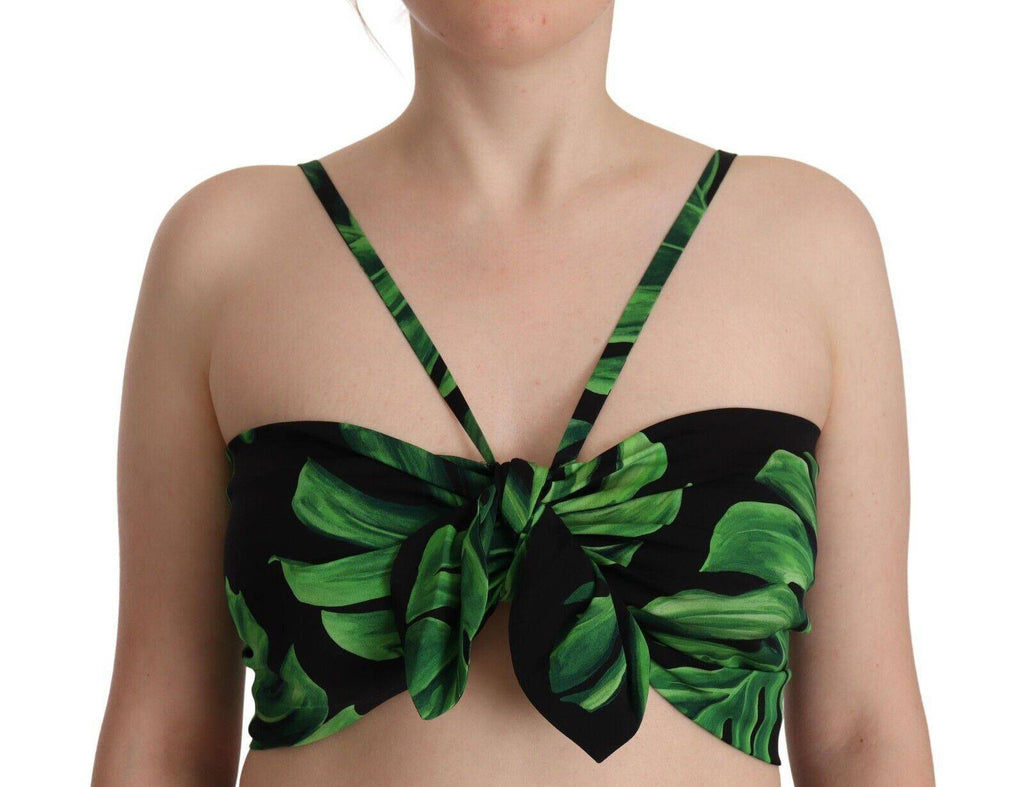 Haut court en soie noir et vert à feuilles, style halter de Dolce & Gabbana, avec détail de motif végétal.