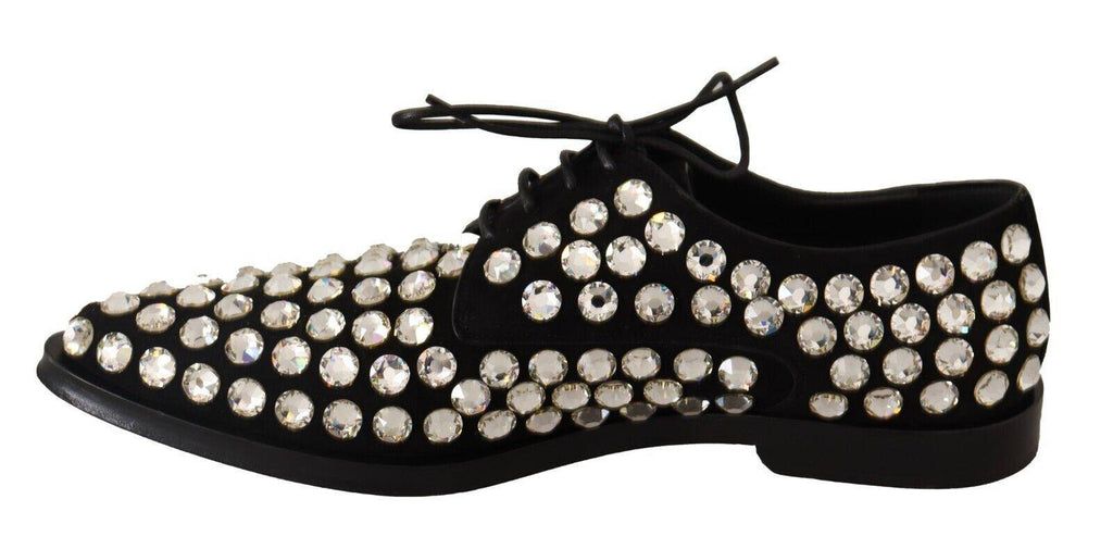 Chaussures formelles en cuir noir Dolce & Gabbana avec cristaux et lacets, élégantes et sophistiquées.