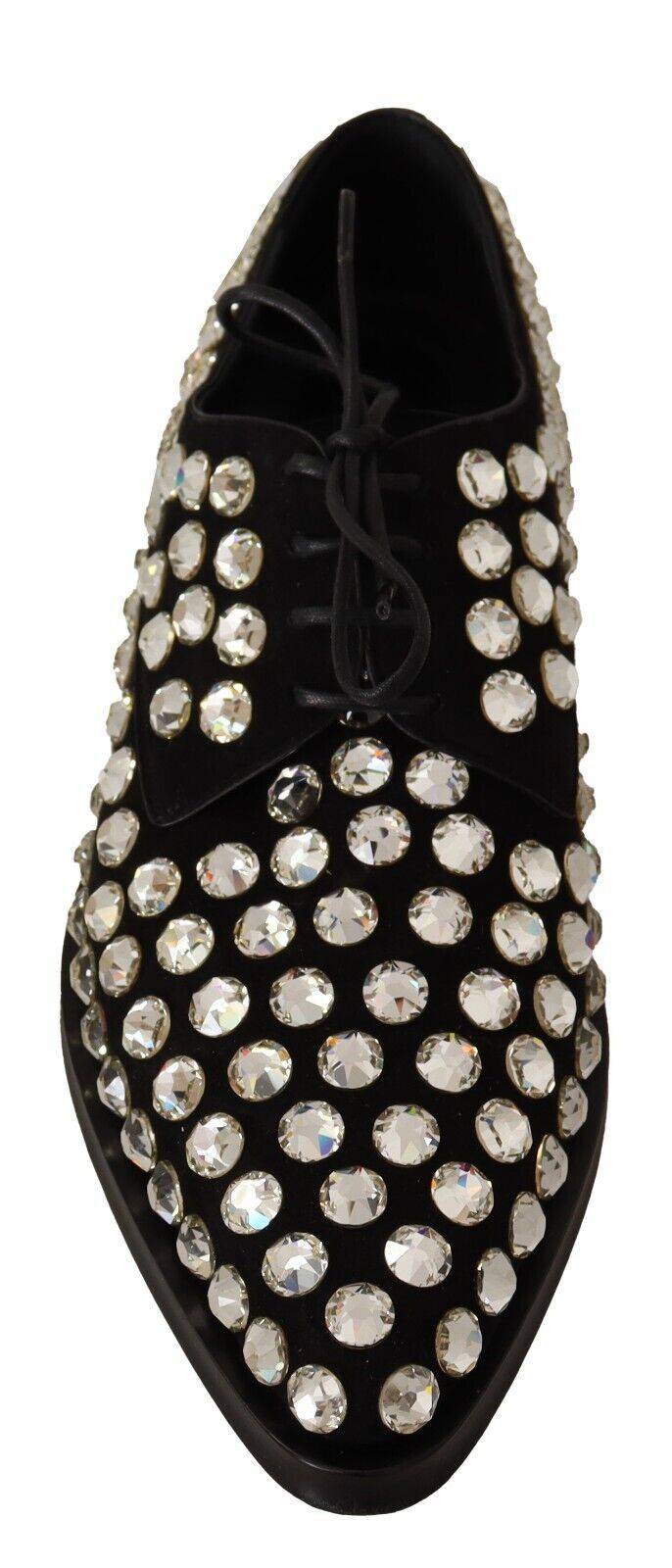 Chaussures formelles en cuir noir avec cristaux et lacets de Dolce & Gabbana, élégantes et sophistiquées.