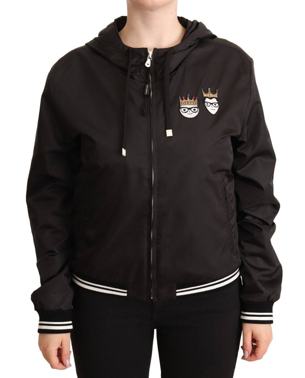 Veste bomber noire en polyester avec capuche et fermeture éclair pleine chez Dolce & Gabbana, vue de face.
