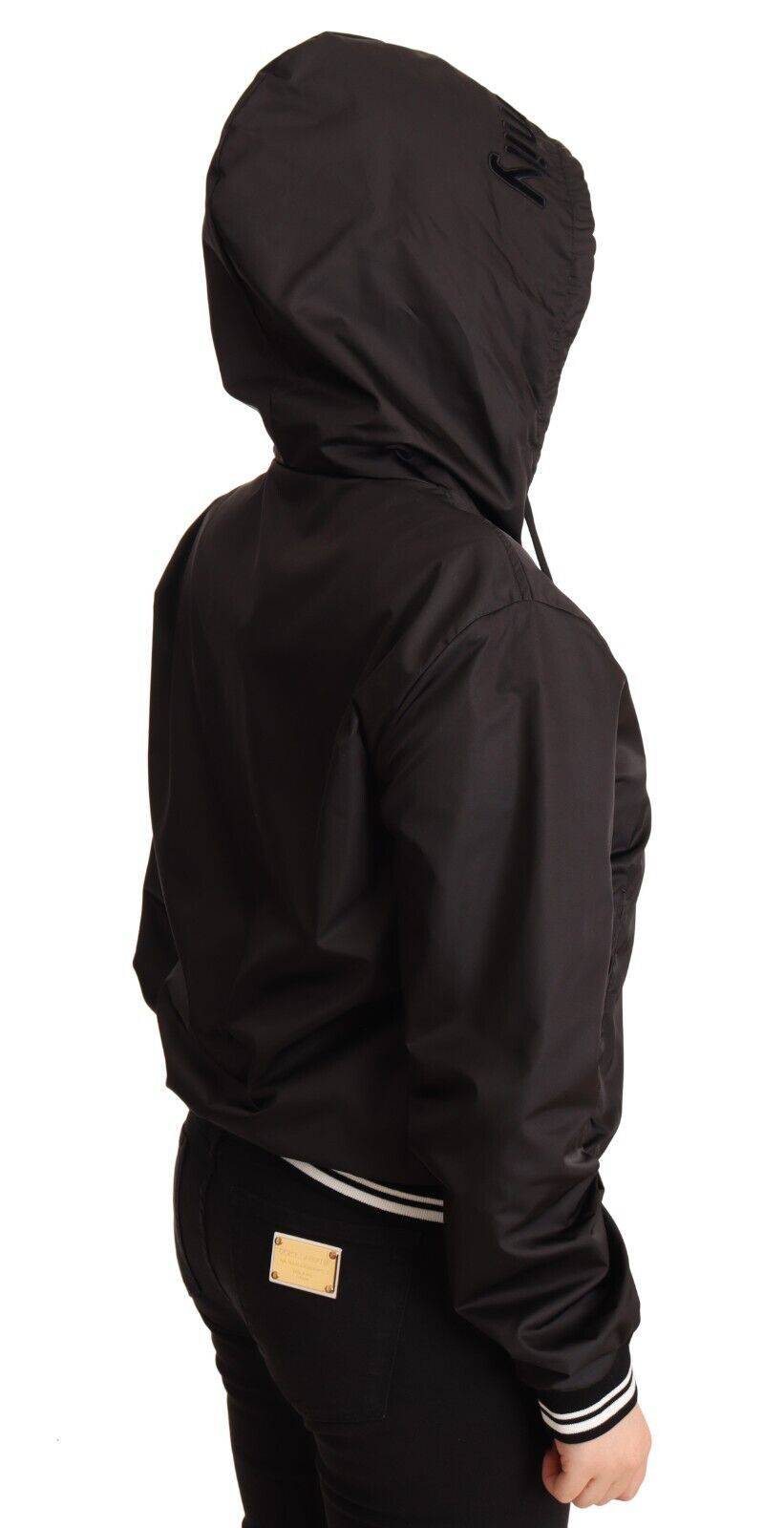 Veste bomber noire en polyester avec capuche à fermeture éclair complète de Dolce & Gabbana, style urbain et moderne.