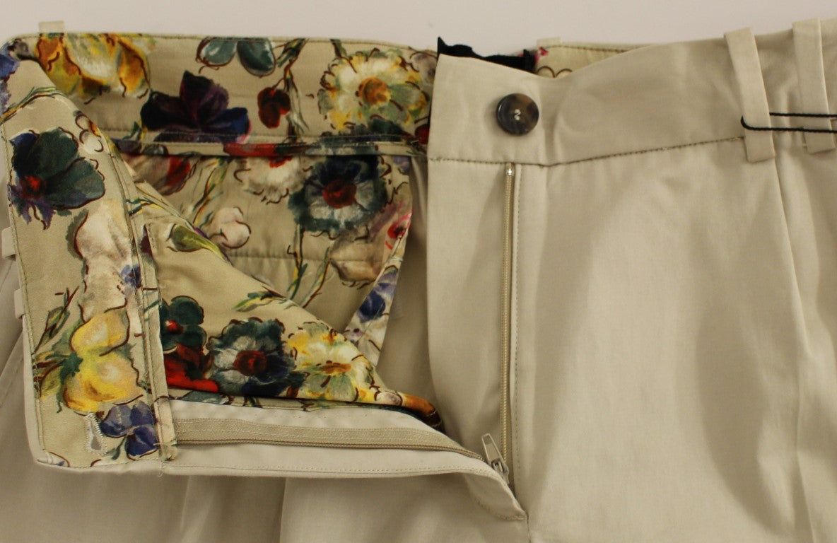Pantalons chino en coton beige de Dolce & Gabbana, style élégant et décontracté, vue frontale sur le produit.
