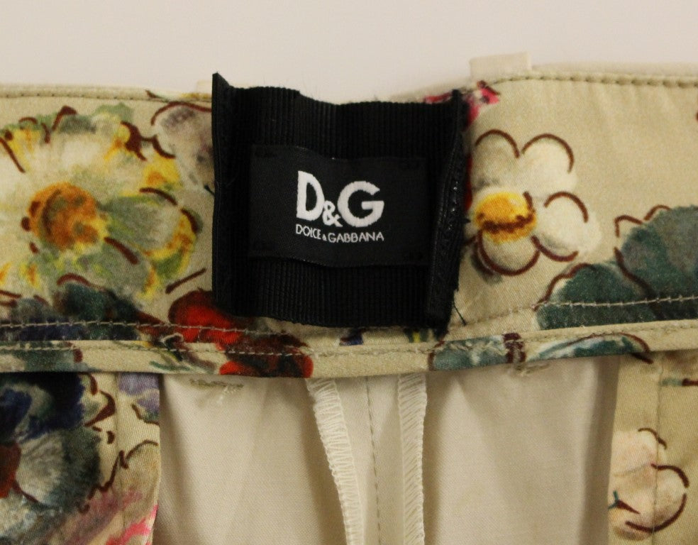 Pantalons chino en coton beige de Dolce & Gabbana, style élégant et décontracté, vue de face sur un fond neutre.