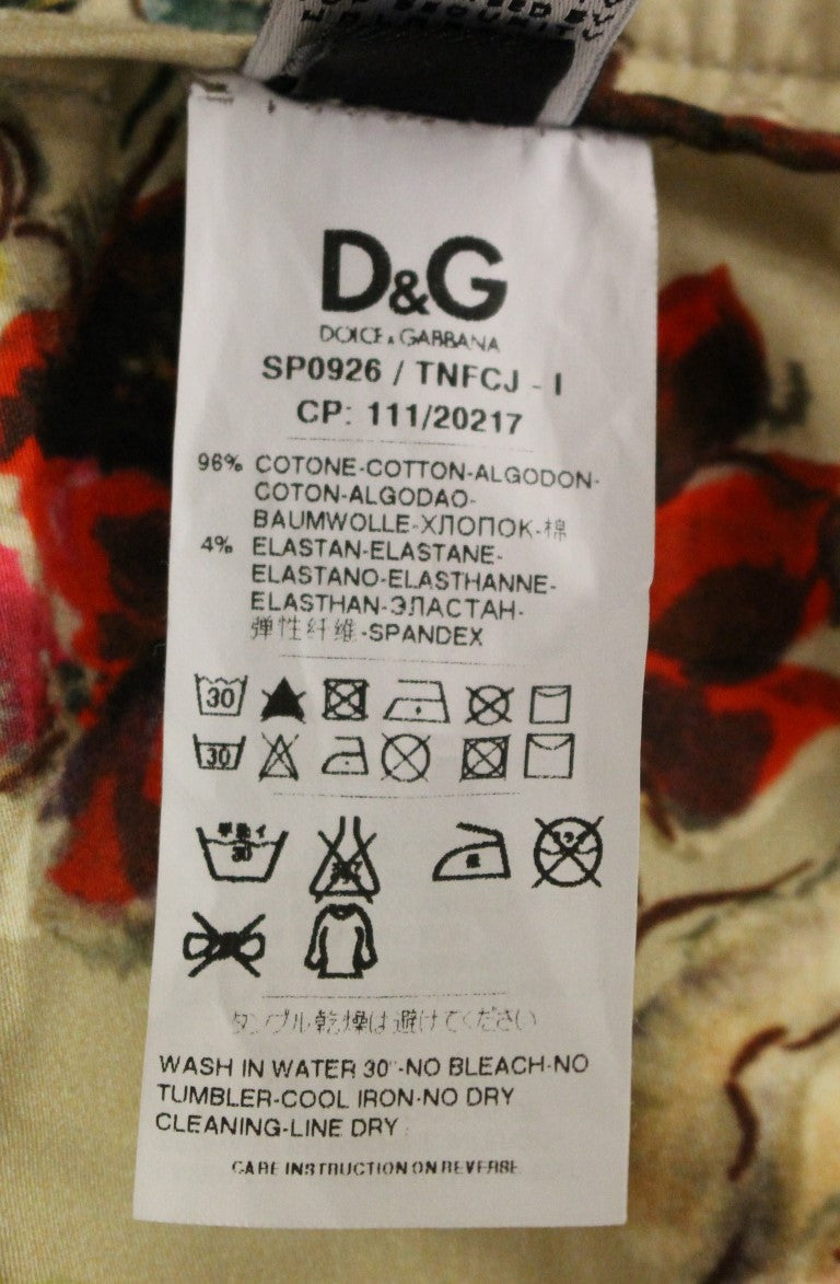 Pantalons chino en coton beige de Dolce & Gabbana, pantalon décontracté pour homme, vue de face.