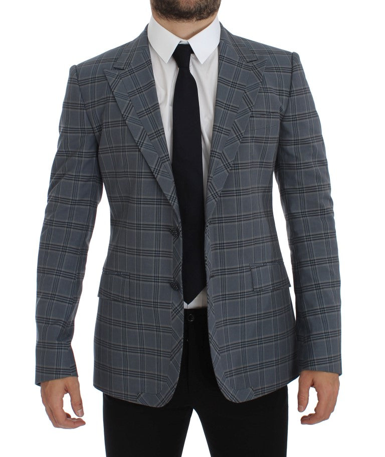 Blazer slim fit à carreaux bleus de Dolce & Gabbana, veste élégante pour homme, détails de couture et boutons sophistiqués.