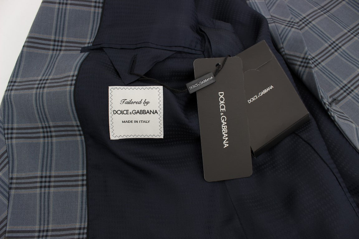 Veste blazer Dolce & Gabbana à carreaux bleus, coupe slim fit, élégante et moderne, portée sur un mannequin.