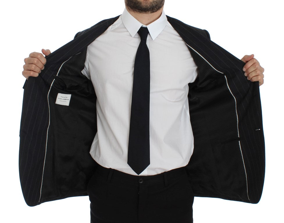 Veste blazer en laine gris à rayures, coupe slim fit, de la marque Dolce & Gabbana, visible sur l'image.
