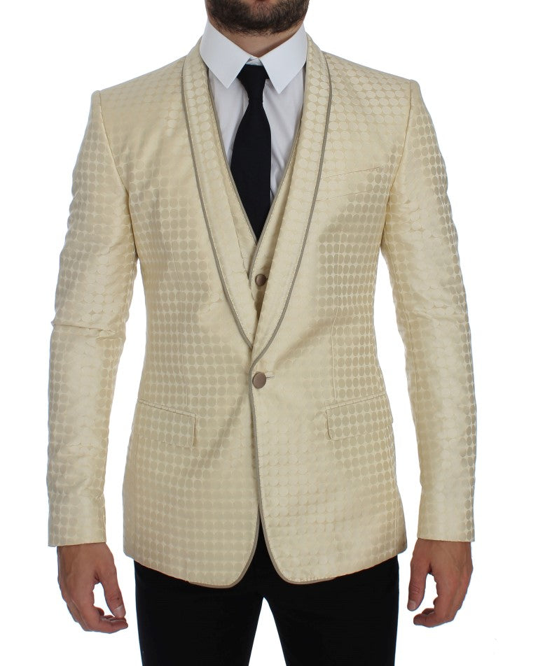Veste en soie beige à pois Dolce & Gabbana, ensemble blazer deux pièces élégant et sophistiqué, détails textiles visibles.