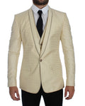 Veste en soie beige à pois Dolce & Gabbana, ensemble blazer deux pièces élégant et sophistiqué, détails textiles visibles.