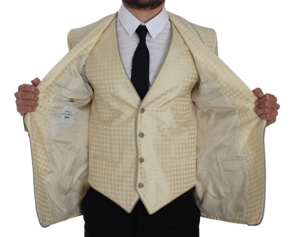 Blazer en soie beige à pois Dolce & Gabbana, ensemble en deux pièces, avec détails élégants et design sophistiqué.