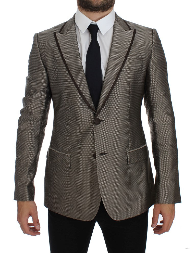 Costume en soie marron Dolce & Gabbana, blazer slim fit à deux boutons, élégant et moderne, visible sur l'image.