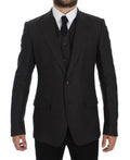 Blazer en lin gris Dolce & Gabbana, coupe slim fit, veste élégante pour homme, détail de couture visible.