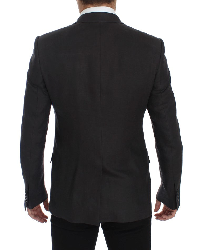 Blazer en lin gris Dolce & Gabbana, coupe slim fit, élégant et léger, porté sur un mannequin.