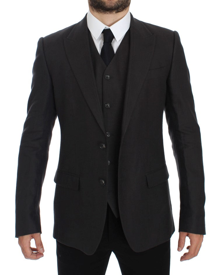 Veste blazer en lin gris Dolce & Gabbana, coupe slim fit, élégante et sophistiquée, visible sur le mannequin.