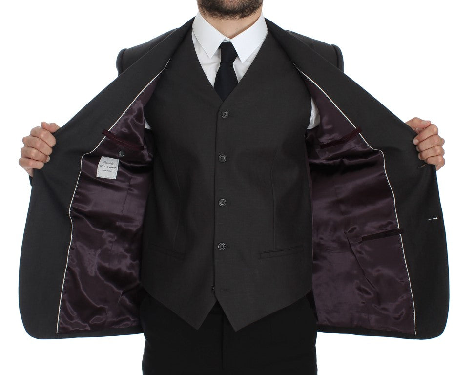 Costume blazer en lin gris Dolce & Gabbana, coupe slim fit, détails élégants, porté sur un mannequin.